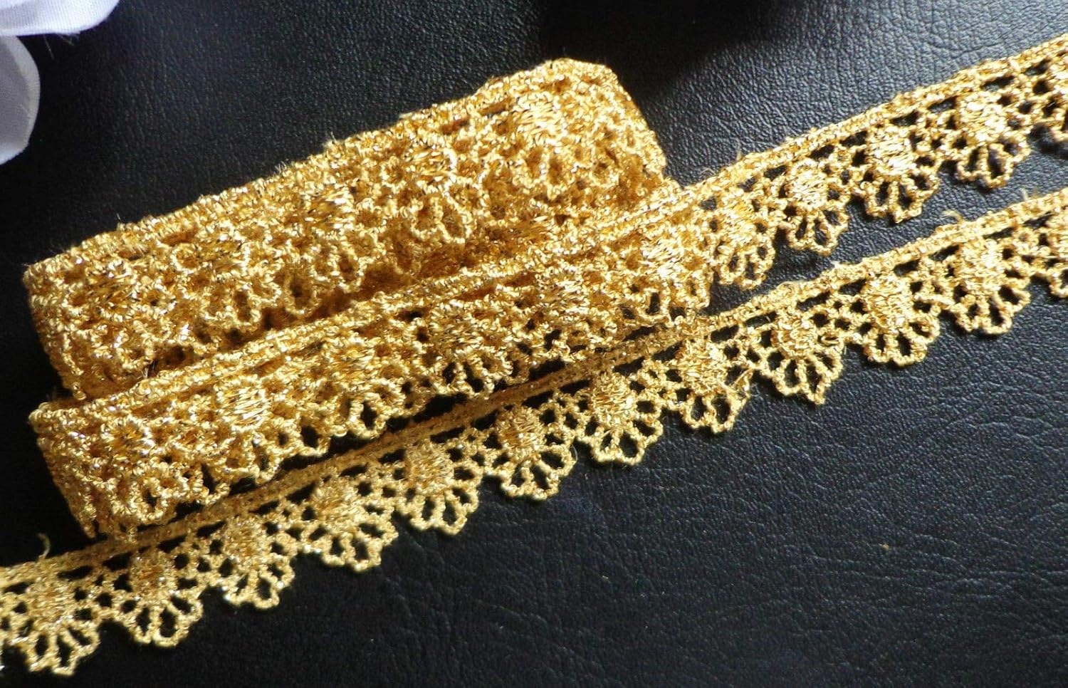 Sewing 1 inch wide gold color metallic trim selling by the yard