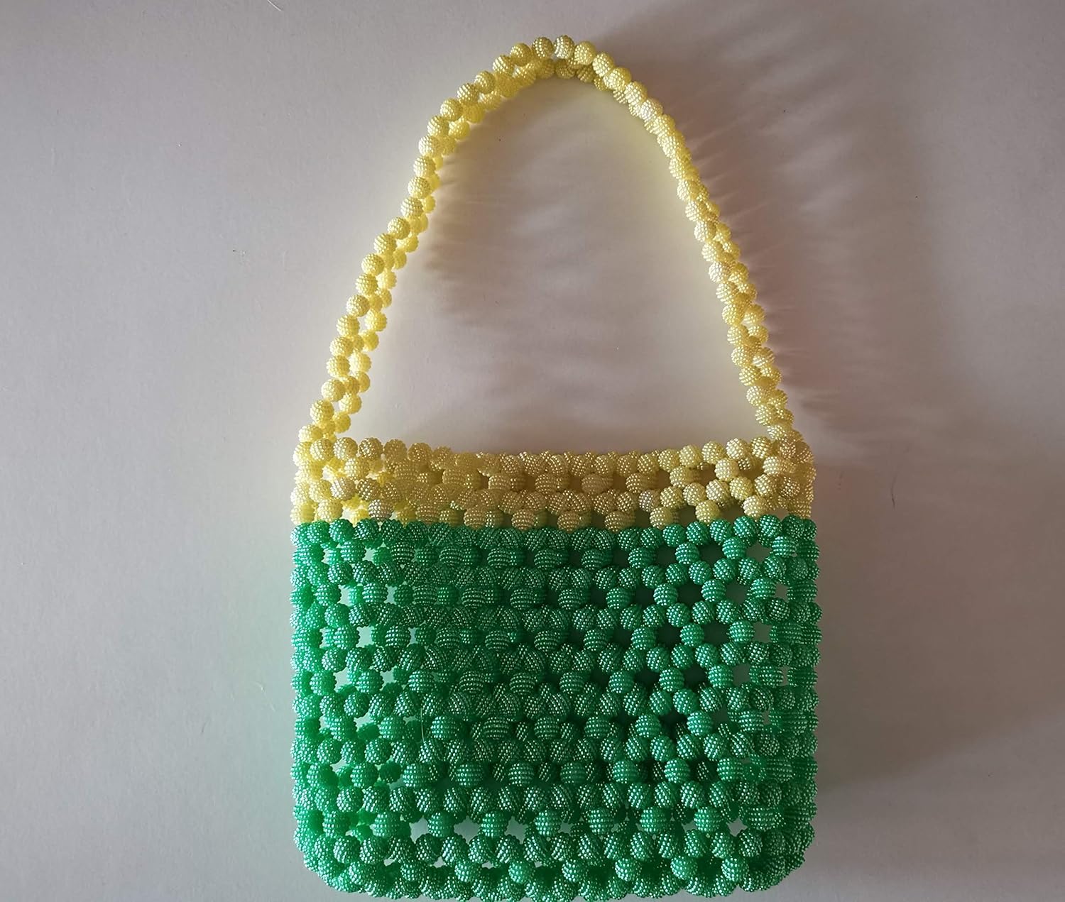 yellow beaded bag