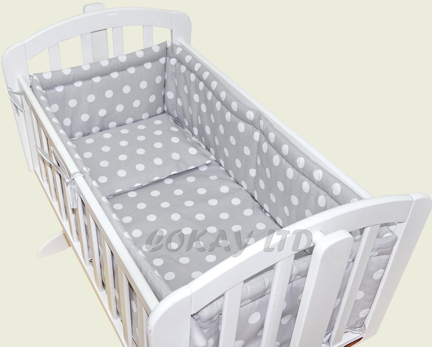 swinging crib bedding