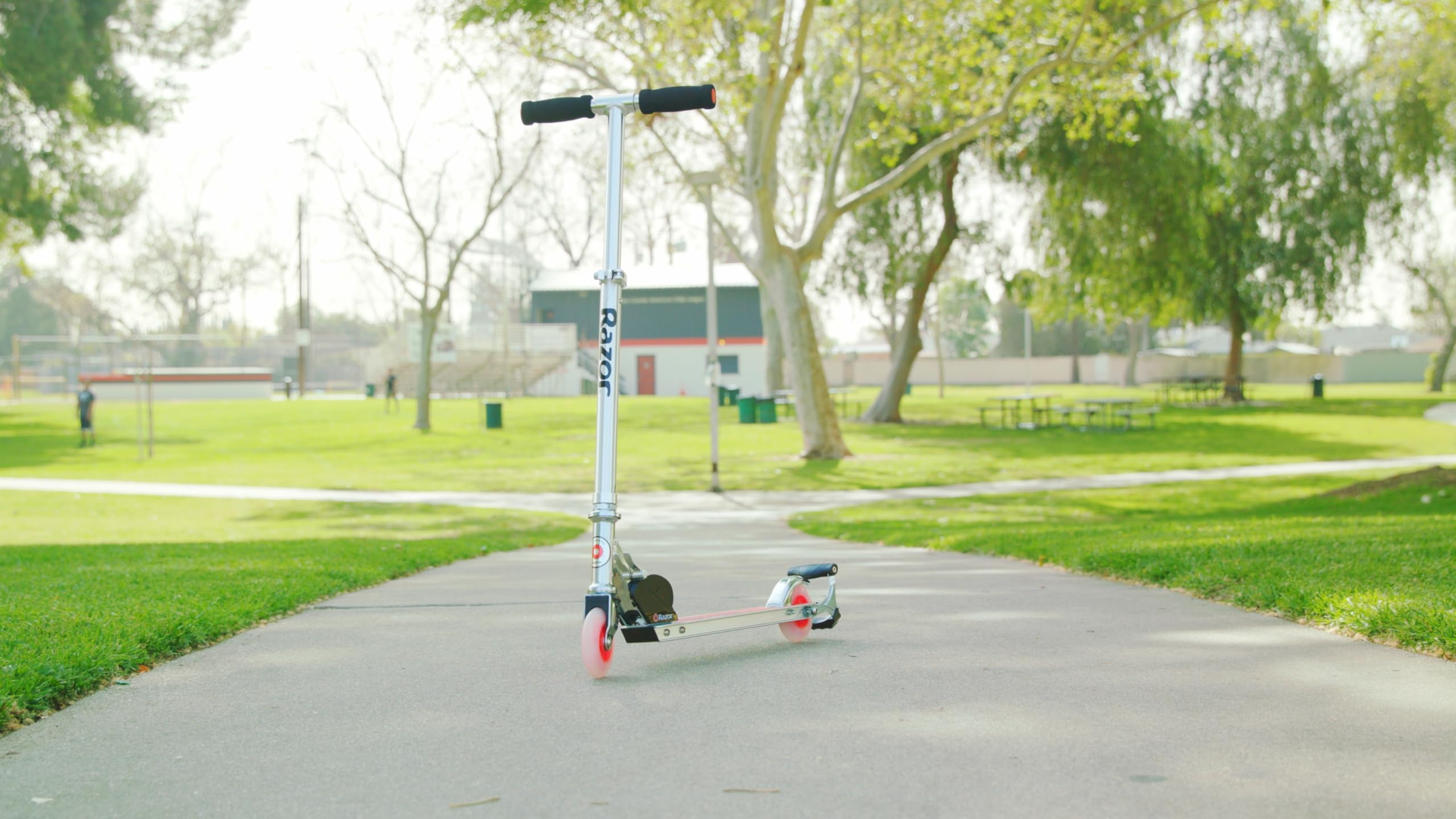 Razor Spark Ultra Kick Scooter for Kids Ages 8+ - Ultra Bright LED Wheels, Rear-Fender Brake, Adjustable Handlebars, for Riders up to 143 lbs