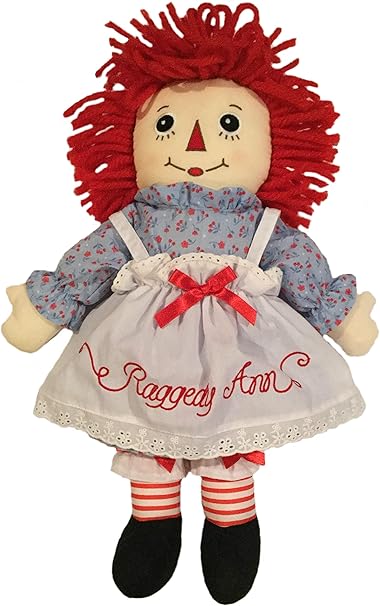 red haired doll with a triangle nose