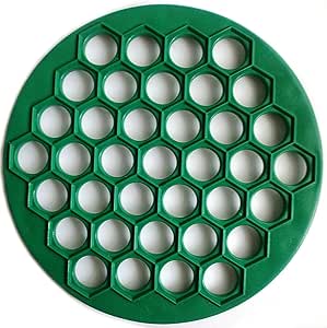 RUSSIAN PELMENI MAKER DUMPLINGS RAVIOLI PLASTIC MOLD by Form for the Russian pelmeni color's may vary