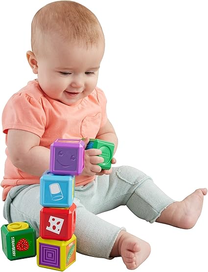 baby playing with blocks