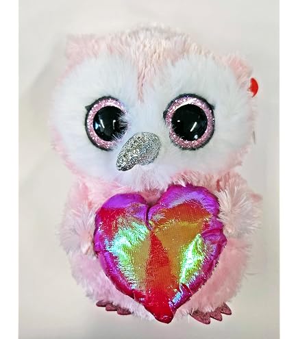 Un hibou de dessin animé avec de grands yeux et un grand sourire
