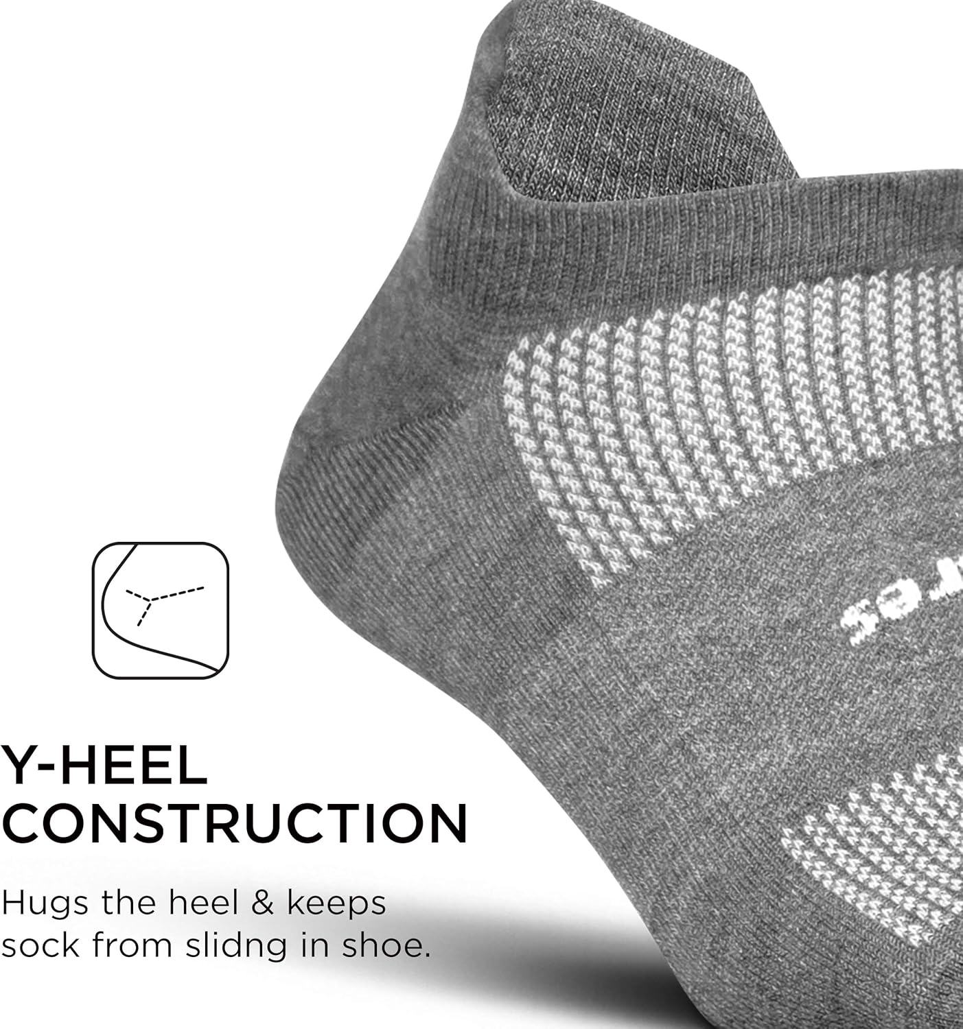 Feetures High Performance Ultra Light No Show Tab Sock Solid: Clothing