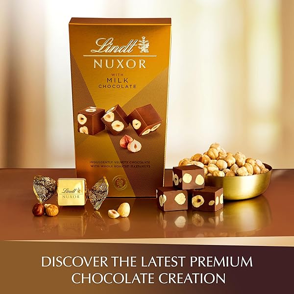 LINDT NUXOR MILK CHOCOLATE CANDY, CHOCOLATE WITH WHOLE ROASTED HAZELNUTS, 5.8 OZ. BOX