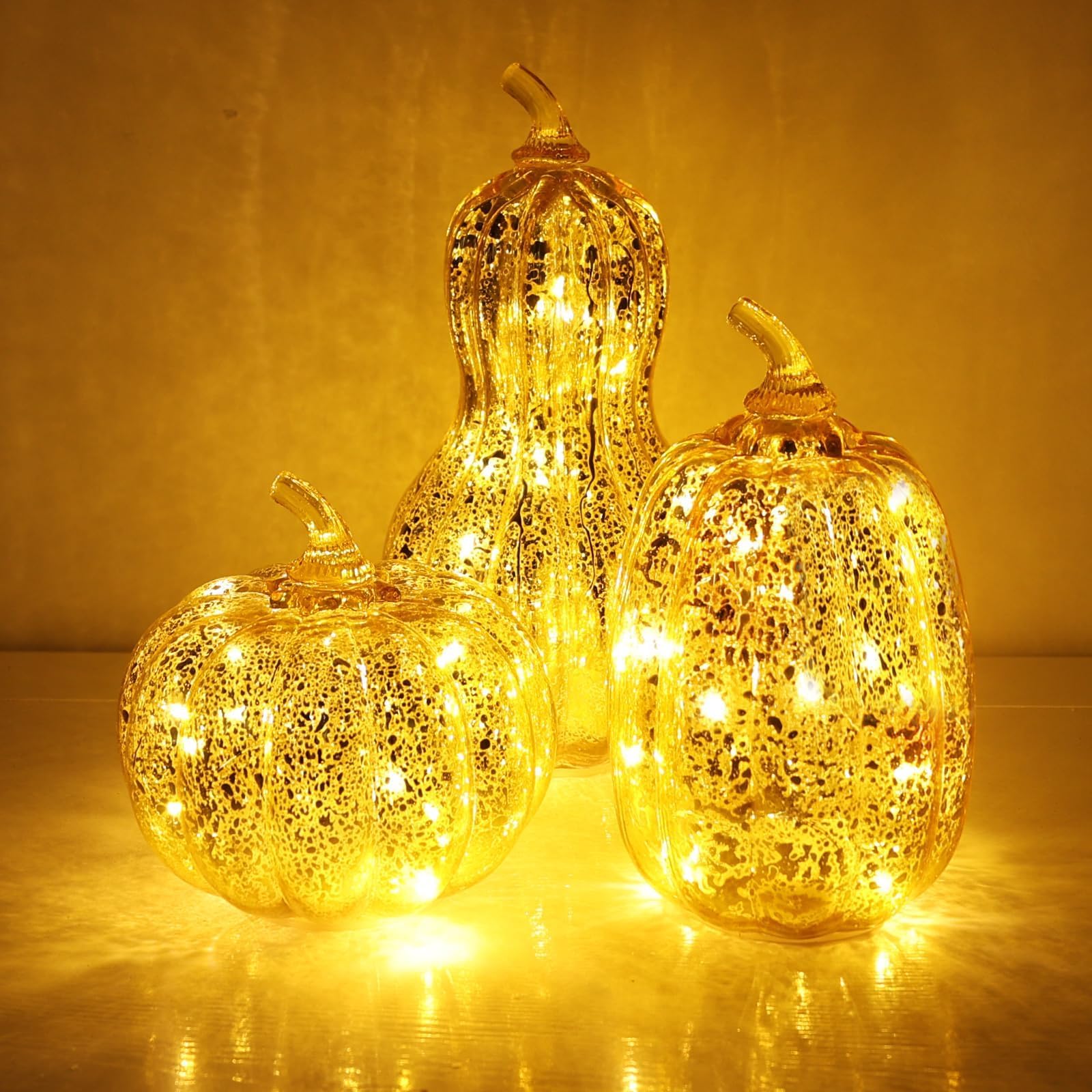 Photo 1 of NEEDOMO Lighted Glass Pumpkin Decor, Set of 3 Gold Mercury Glass Pumpkins with Lights and Timer for Fall Thanksgiving Decorations, LED Collectible Figurines Fall Centerpiece for Tables Home