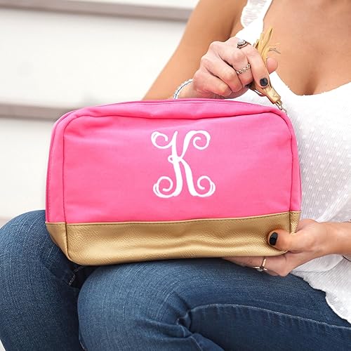 pink and gold clutch bag