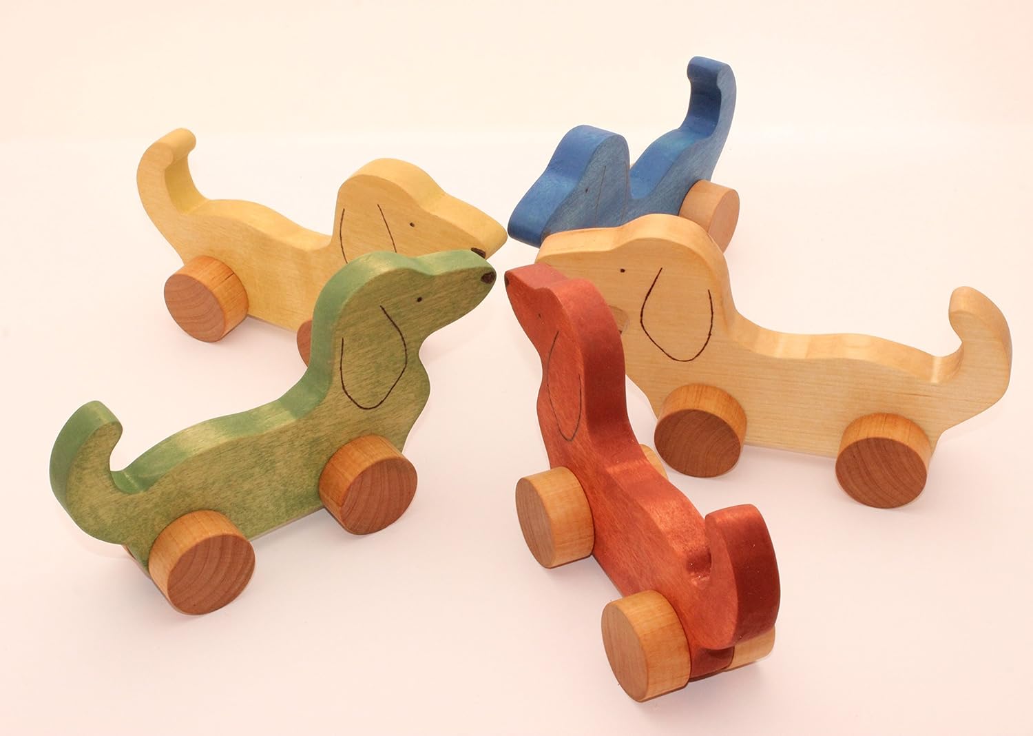 Wooden toy dog on wheels. Wood toys. Animals. Toddler toy. Baby toy