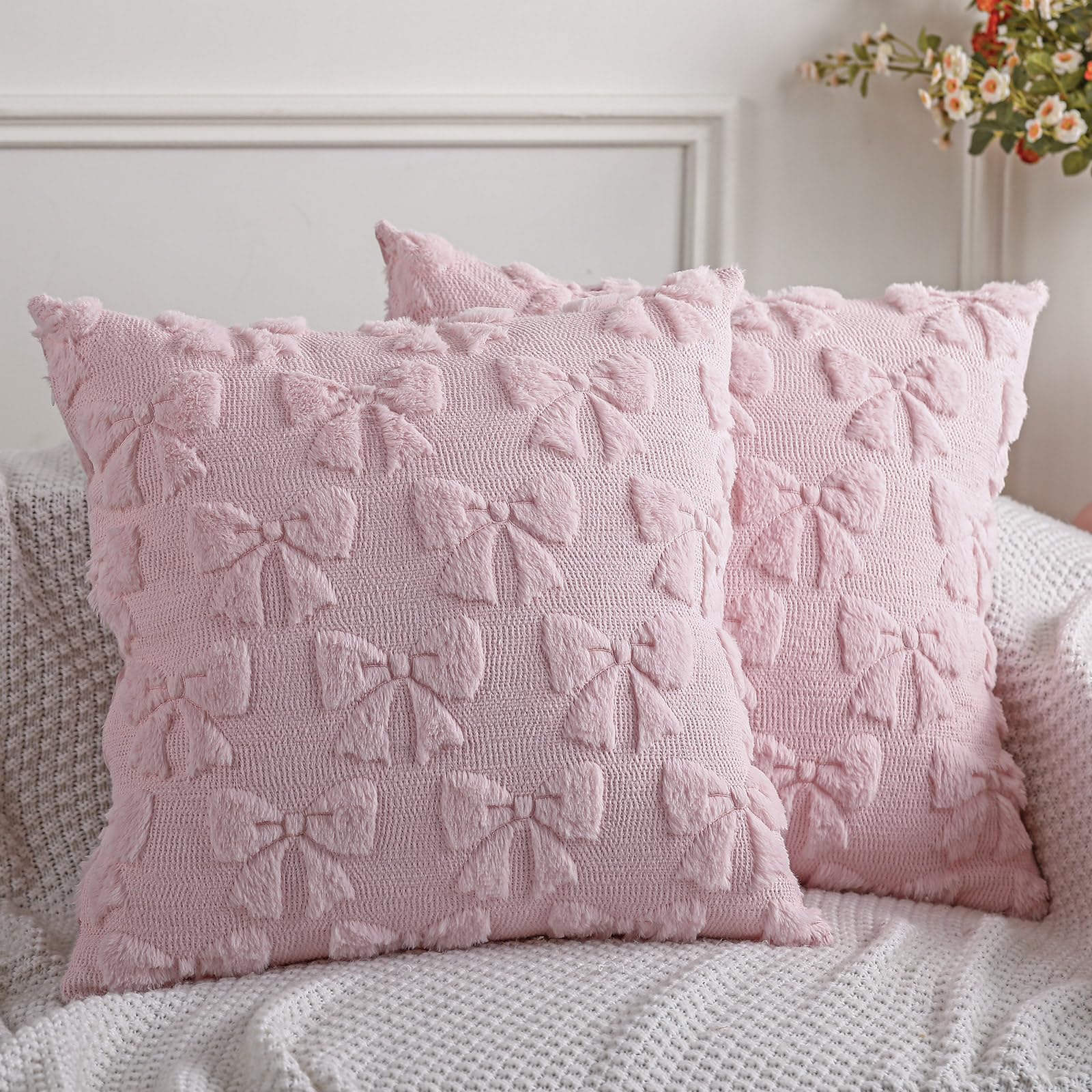 Photo 1 of Mixweer Bow Pillow Covers Set of 2 Coquette Room Décor Cute Faux Fur Soft Bowknot Preppy Stuff Fluffy Plush Aesthetic Pillow Covers for Bed Sofa Couch, Fall Christmas Décor (20 x 20 Inch, Pink)