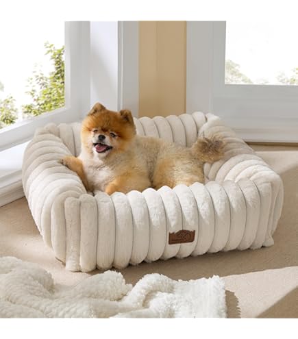 Beige velvet pet bed with tufted cushion