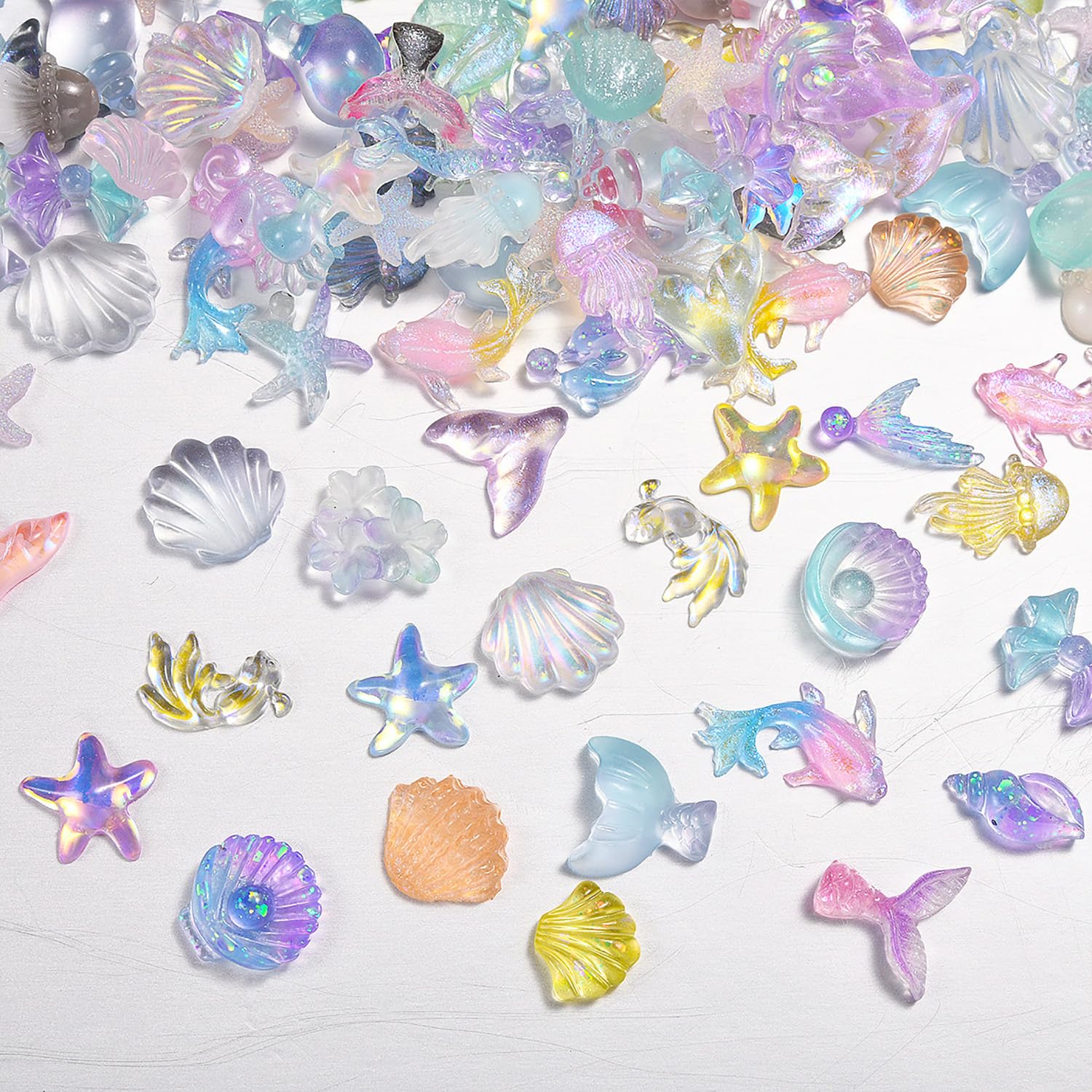 Photo 1 of 100Pcs Marine Life Nails Charms 3D Seashell Starfish Nail Gems and Charms Cute Summer Nail Rhinestones Multi Shape Resin Mermaid Shell Ocean Theme Nail Jewelry for Women Nail Art Designs