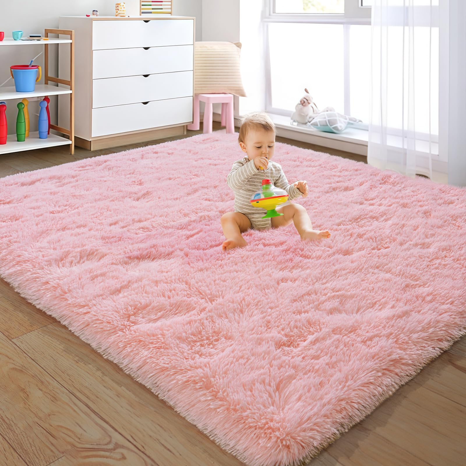 Photo 1 of Rezutan Soft Fluffy Rug for Living Room Bedroom, Large Comfy Modern Shaggy Fuzzy Kids Rug, Plush Indoor Nursery Classroom Home Decor Bedside with Non-Slip Bottom, Pink, 5X7 Feet