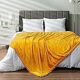 PAVILIA Fleece Throw Blanket for Couch with Pom Pom