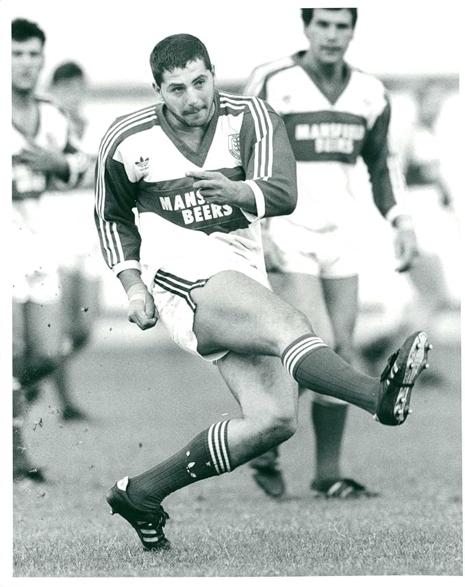 Vintage photo of Player Mike Fletcher in action
