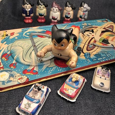 Amazon 1960年代 当時物 アトム ブリキ 自動切替え板レール ブリキの鉄腕アトム 明治製菓 アニメ 萌えグッズ 通販