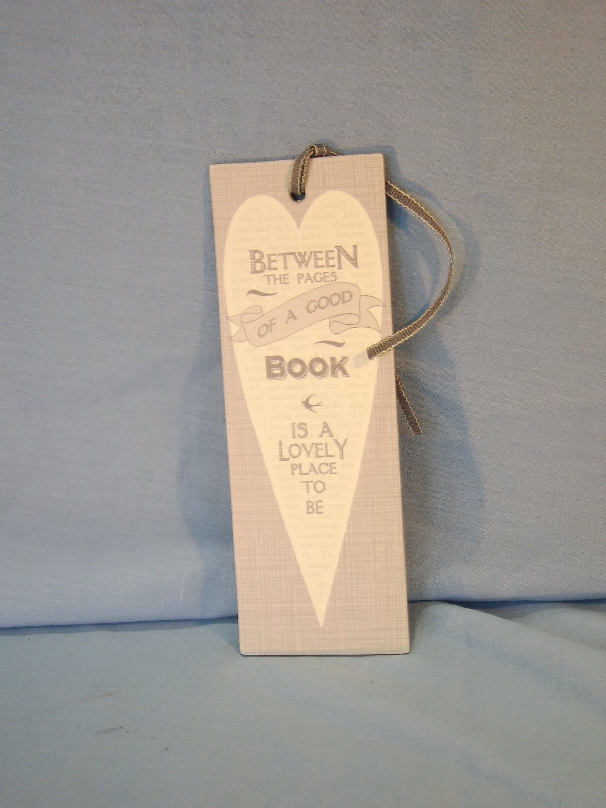 East of India - "Between The Pages Of A Good Book Is A Lovely Place To Be" - Bookmark