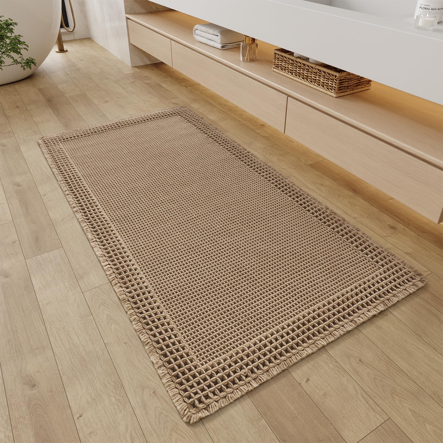 Photo 1 of RESARE Waffle Bathroom Runner Rugs, Super Absorbent Bath Mat Non Slip Washable Quick Dry, Upgraded Ultra Soft Boho Bath Rugs with Tassels for Hallway Bedroom Laundry Room, 2'x4'(24"x48"), Brown