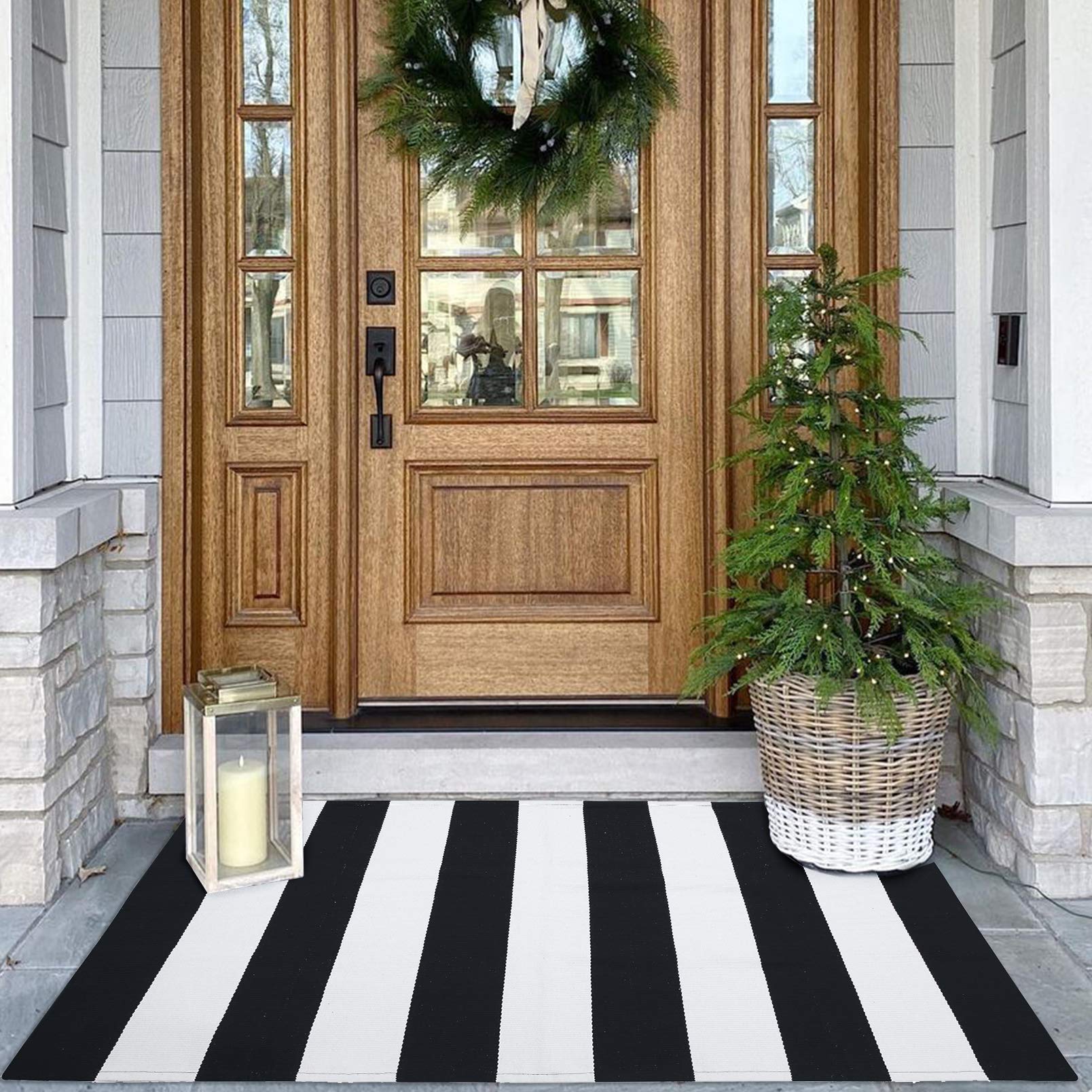 Photo 1 of KOZYFLY Black and White Area Rug 27.5x43 Inches Striped Front Door Rug Cotton Washable Indoor Outdoor Rug Doormats Outdoor Small Striped Rugs for Kitchen Entryway Patio Front Porch Decor