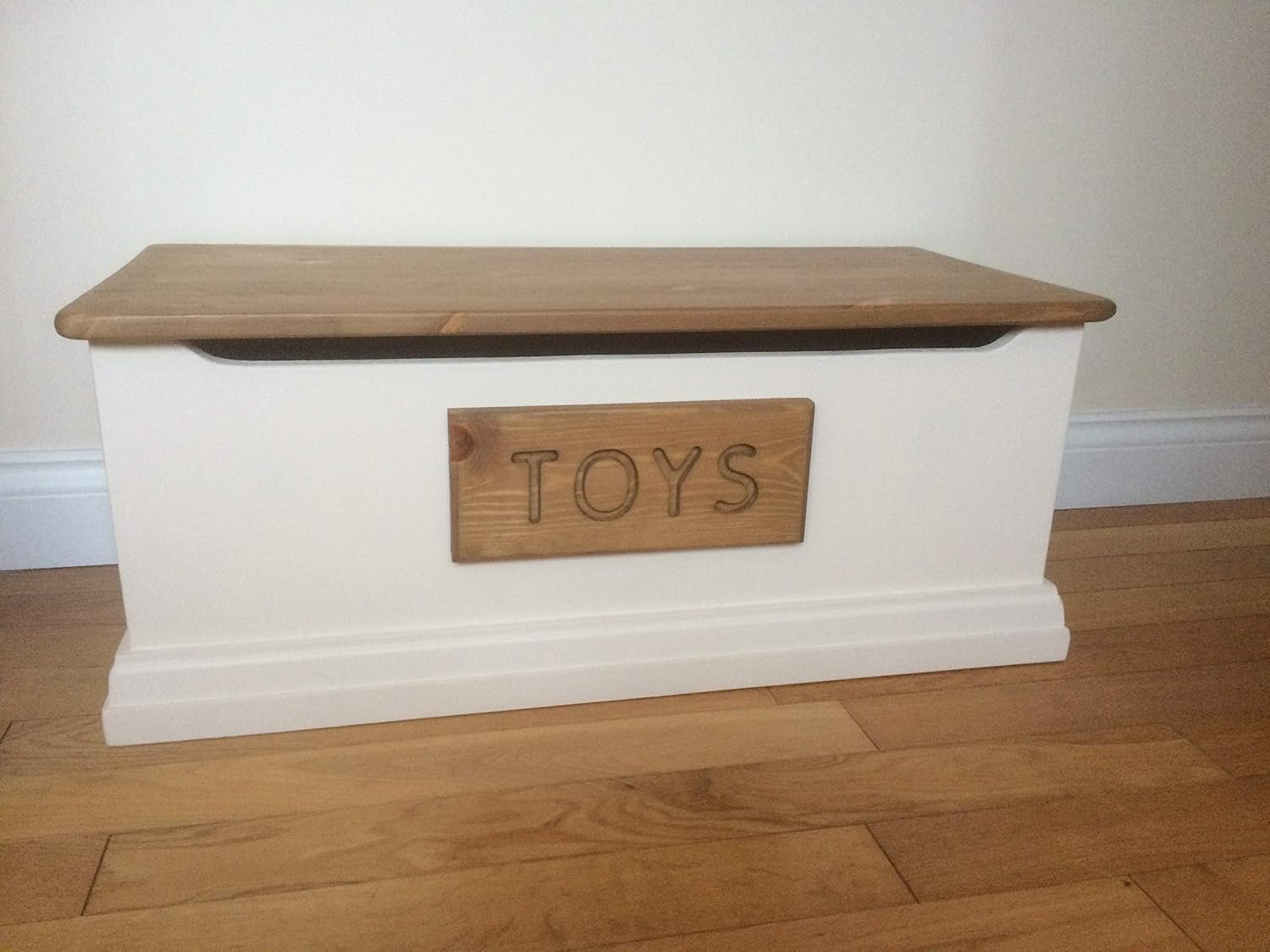 cream wooden toy box