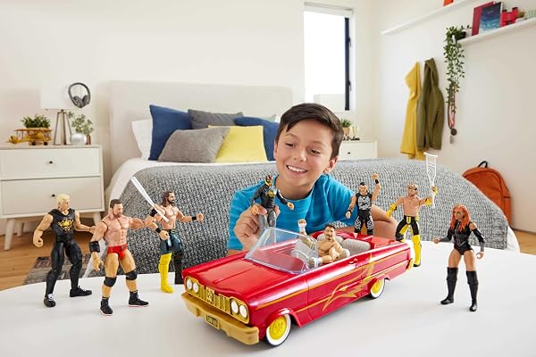 MATTEL WWE ACTION FIGURE & TOY VEHICLE SET, REY MYSTERIO MAIN EVENT FIGURE & LUCHA LOW RIDER CAR WITH LAUNCHING ACTION & HYDRAULICS