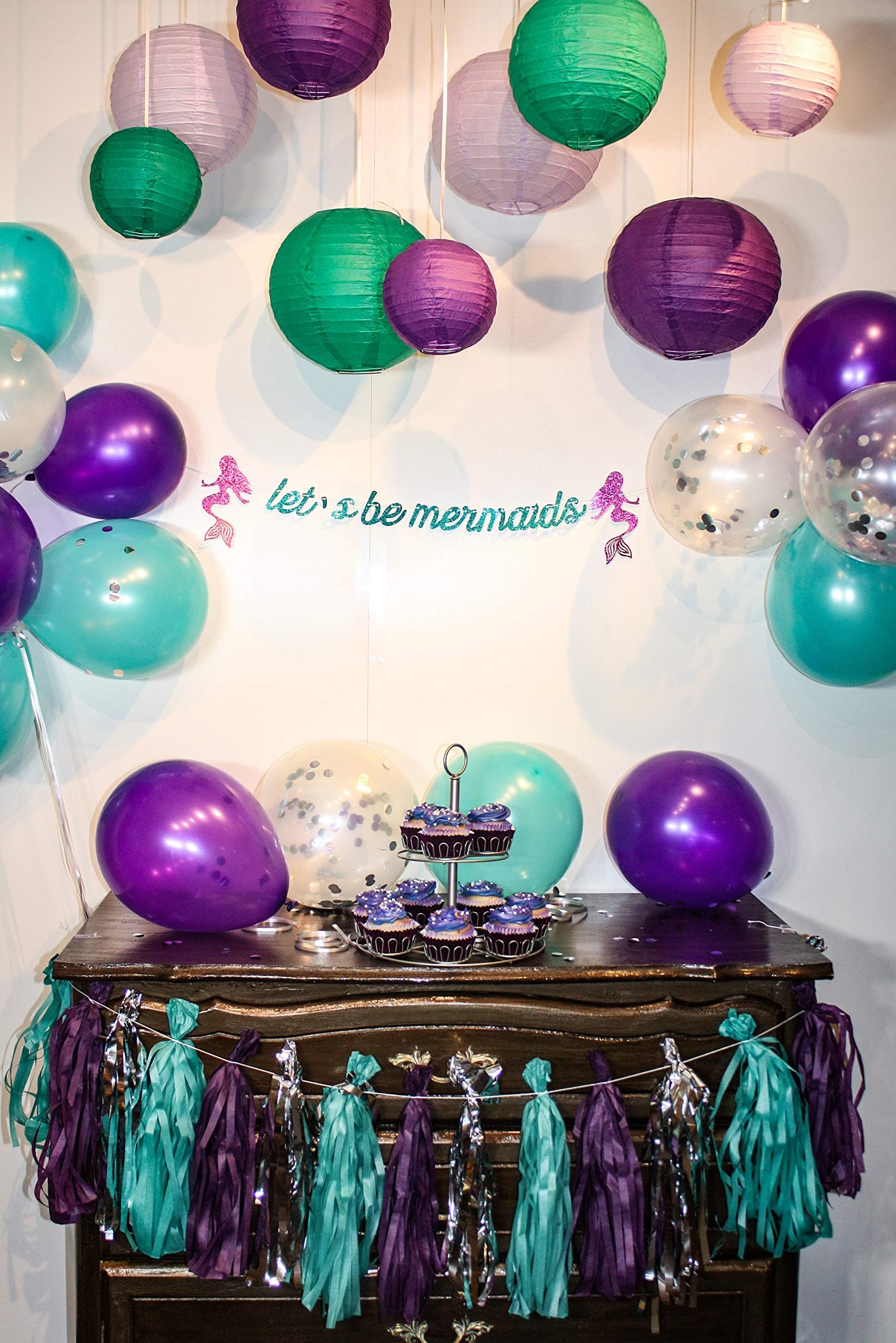 Let’s Be Mermaids Party Decoration Kit. Paper Lanterns, Confetti Balloons, Tassel Garland, and a “Let’s be Mermaids” Banner. Great for a Birthday Party or Under The Sea Party.