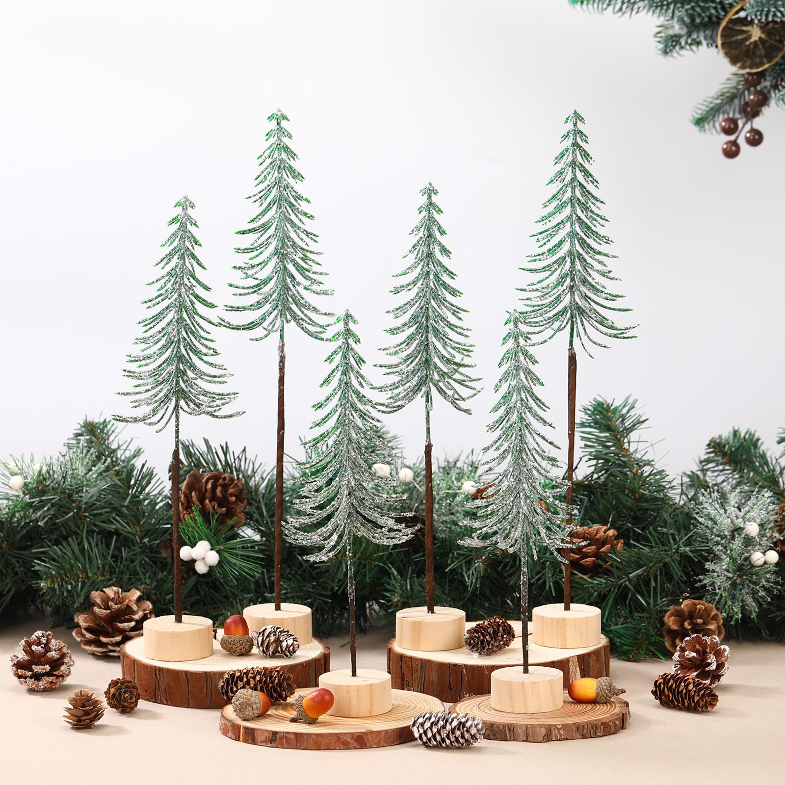 Photo 1 of Jetec 6 Pcs Mini Christmas Tree Small Alpine Trees Tabletop Artificial Pine Christmas Tree with Wooden Base Snow Frost Village Bottle Brush Trees Holiday Season Decoration Centerpiece Displays(Green)