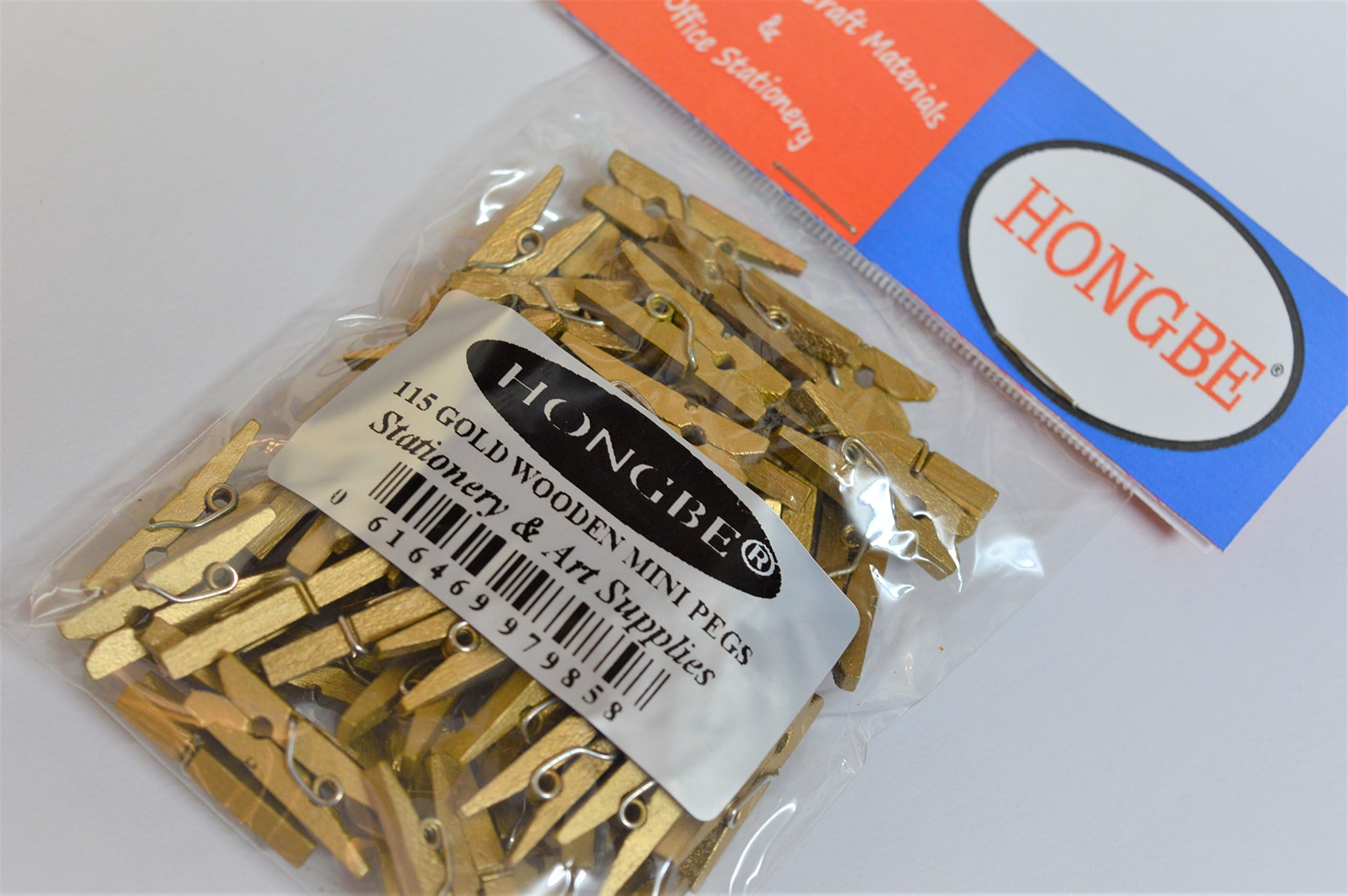 115 GOLD WOODEN MINI PEGS by tipan