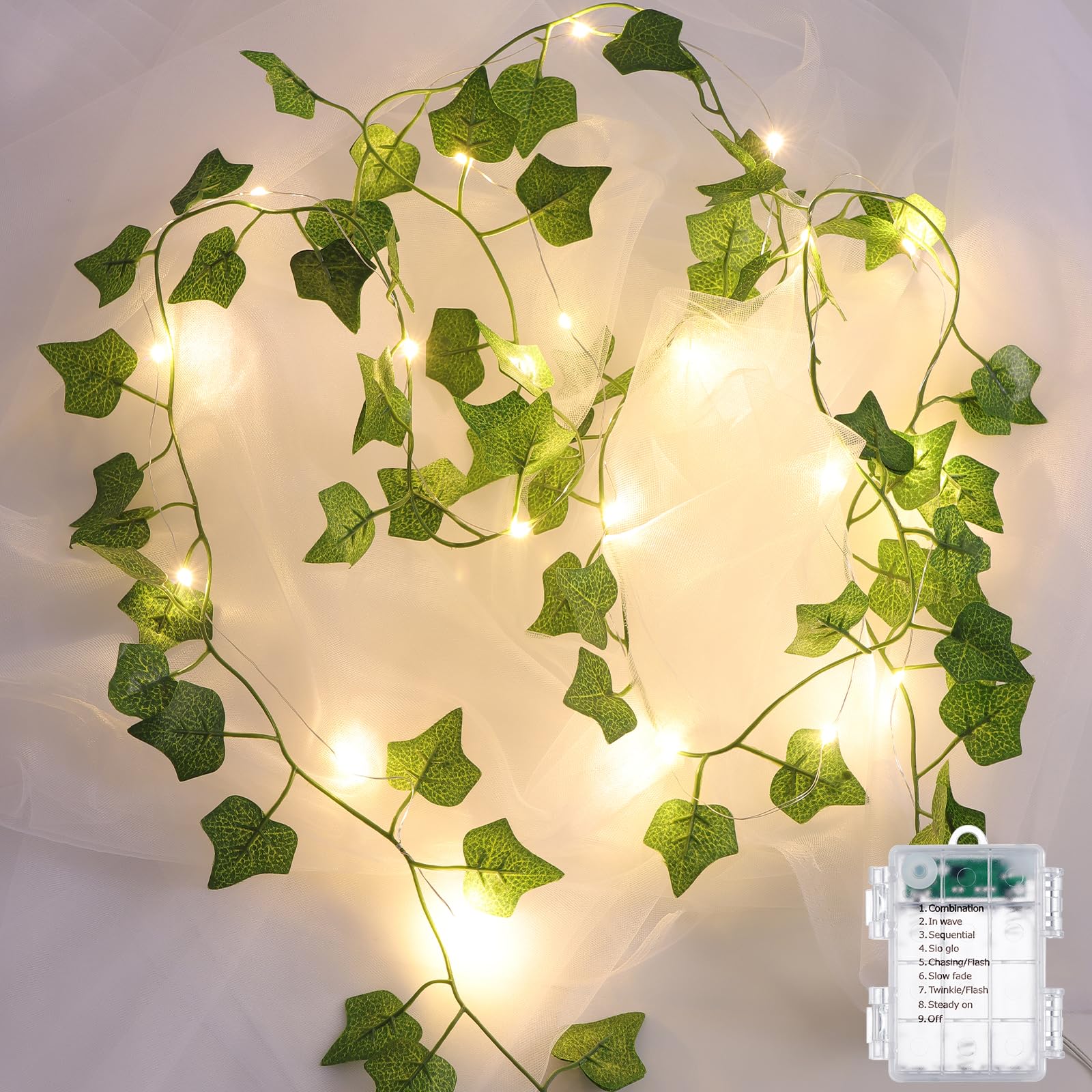Photo 1 of JOLAIQIAN Vines with Lights Battery Operated, 6.56ft 20 LED Vines with Fairy Light, Leaf Light with 8 Modes, Fake Vines Ivy String Lights for Bedroom, Wall, Room, Garden, Party Decor, 1 Pack