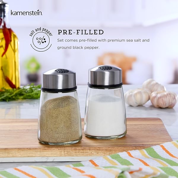 KAMENSTEIN SALT AND PEPPER FILLED GLASS SHAKERS WITH ROTATING SHIFTERS. FEATURES SWIVEL TOP WITH 4 SETTINGS- LIGHT SEASONING, HEAVY SEASONING, POUR, CLOSE, SET OF 2