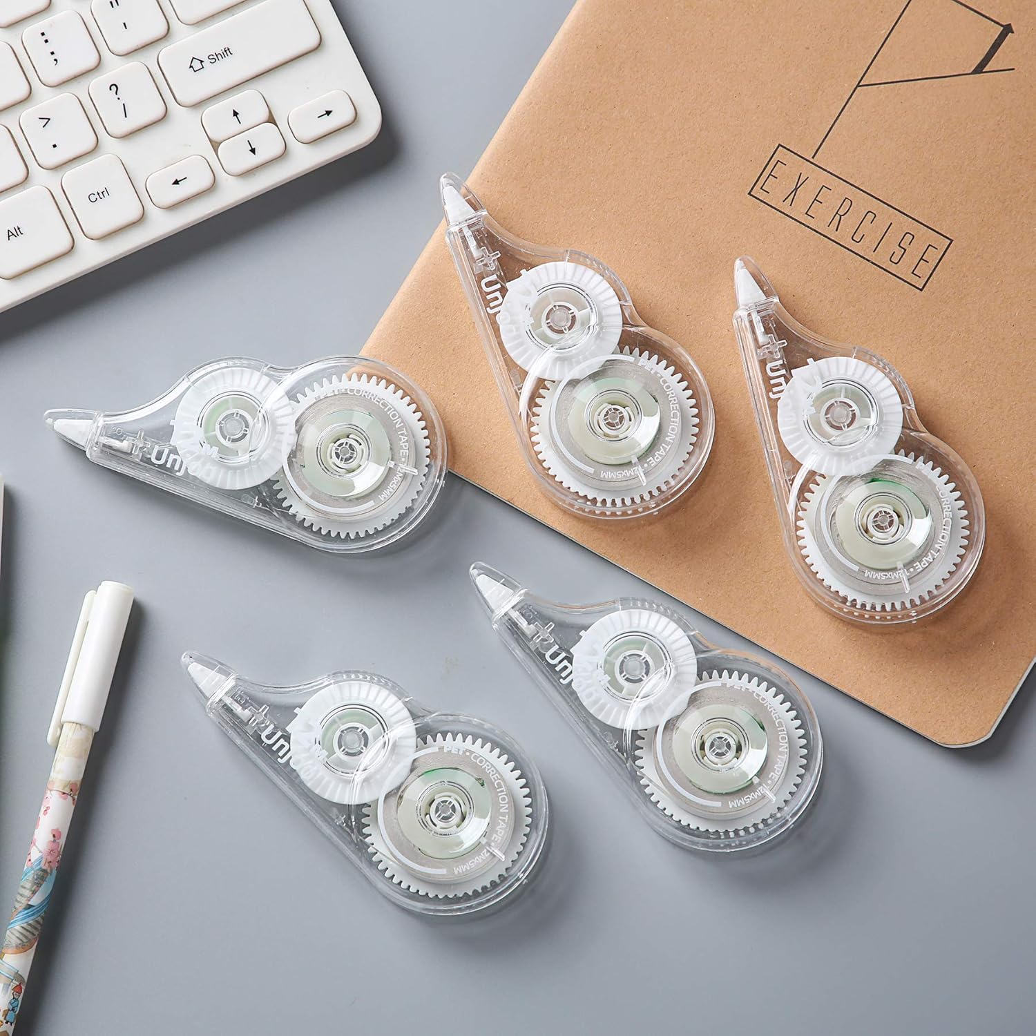 Unjoo Whiteout Correction Tape, 39.3feet x 1/5inch, Instant Corrections, Easy To Use Applicator, For school, Office Administration, Crafting, Note Taking, Bullet Journal, Scrapbooking (12-pack, Clear) : Office Products
