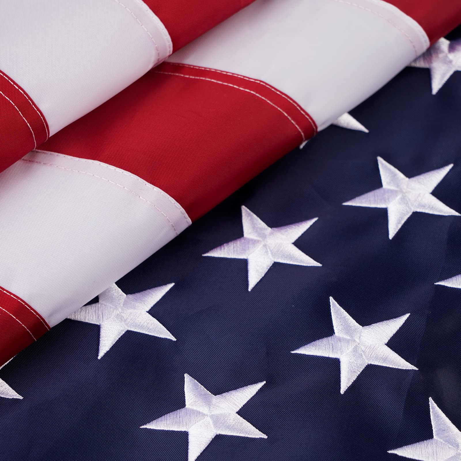 Photo 1 of SYII American Flag 4x6 Ft Outdoor, Heavy Duty Polyester US Flags with Embroidered Stars, Sewn Stripes, and 2 Brass Grommets, All Weather America Flags for Outside High Wind