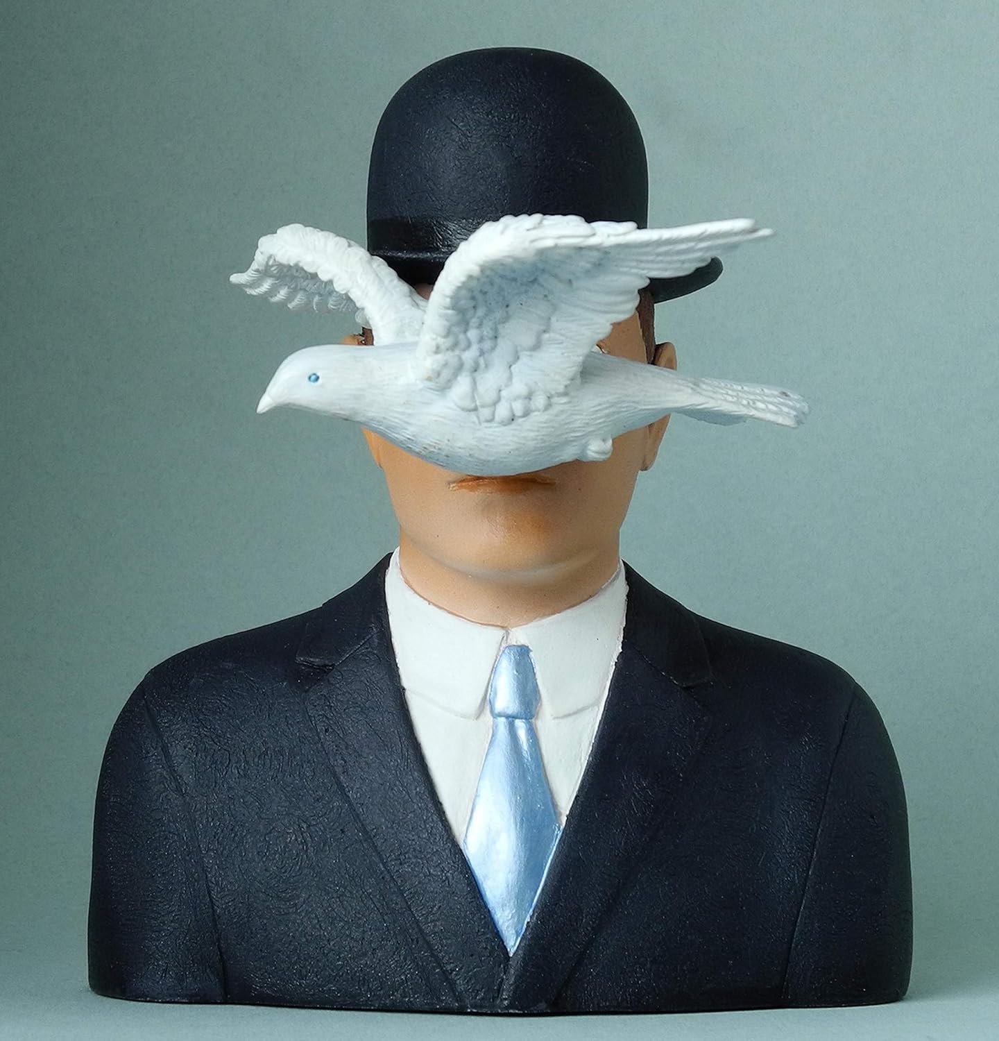 L Uomo Con La Bombetta Magritte