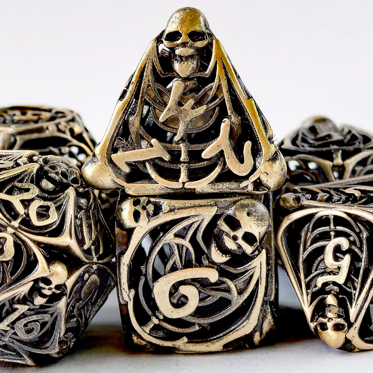 Copper Hollow Polyhedral DND 7pcs Dungeons and Dragons Metal dice with 3D Skull Feature, Hollowed Metal Dice Ancient Gold