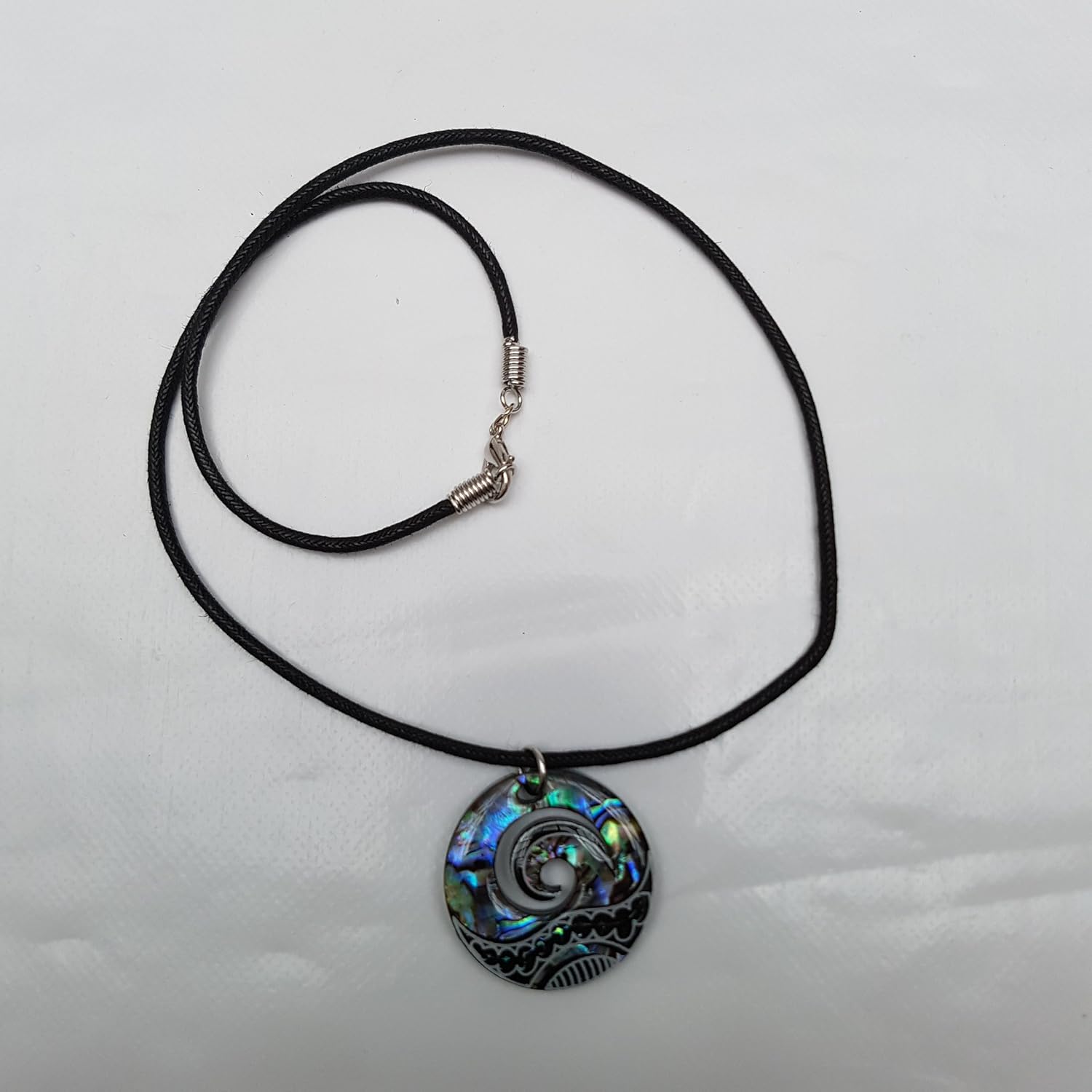 Kiara Jewellery Maori Koru or Wave Crest Pendant Necklace Inlaid With Bluish Green Paua Abalone Shell on 18" Black Cord On Black Plastic Back Disc - Image 4