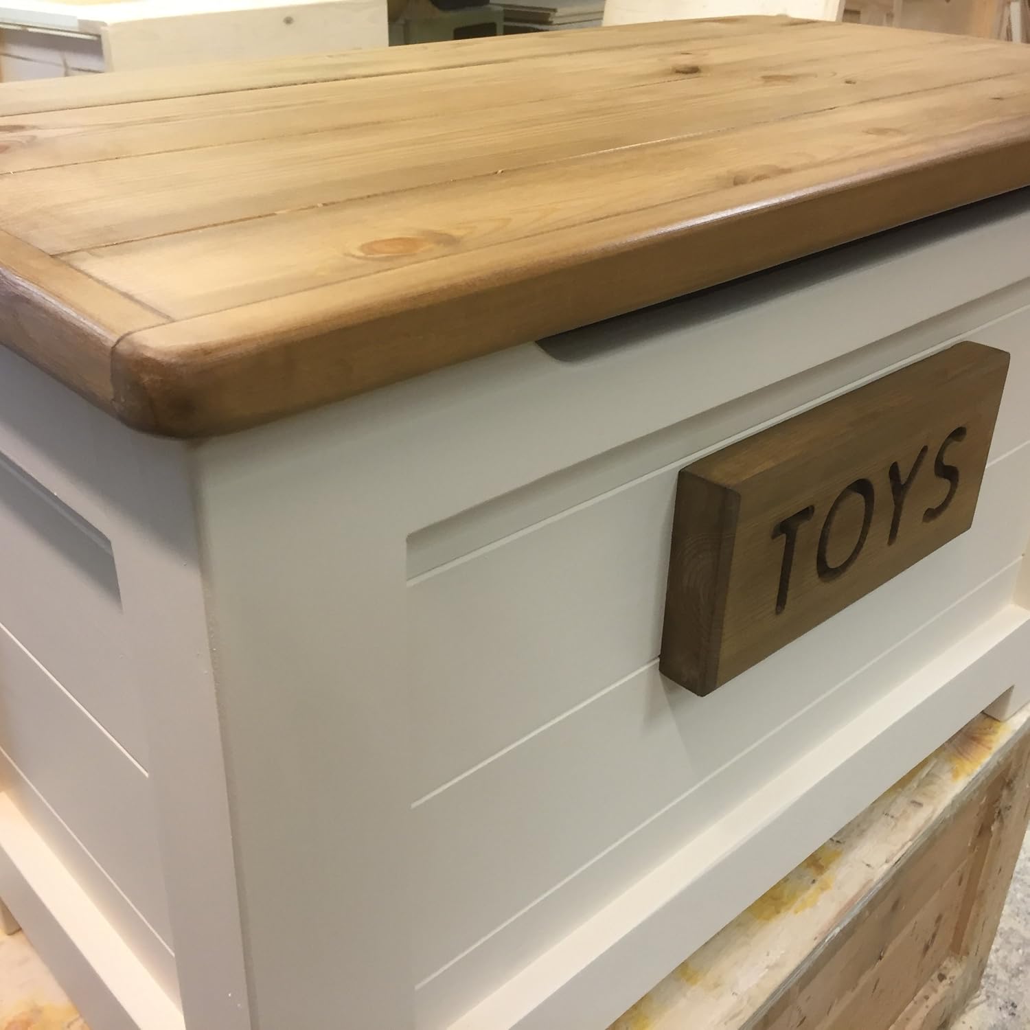 toy boxes with names on