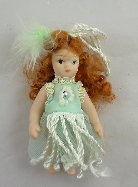 porcelain doll green dress