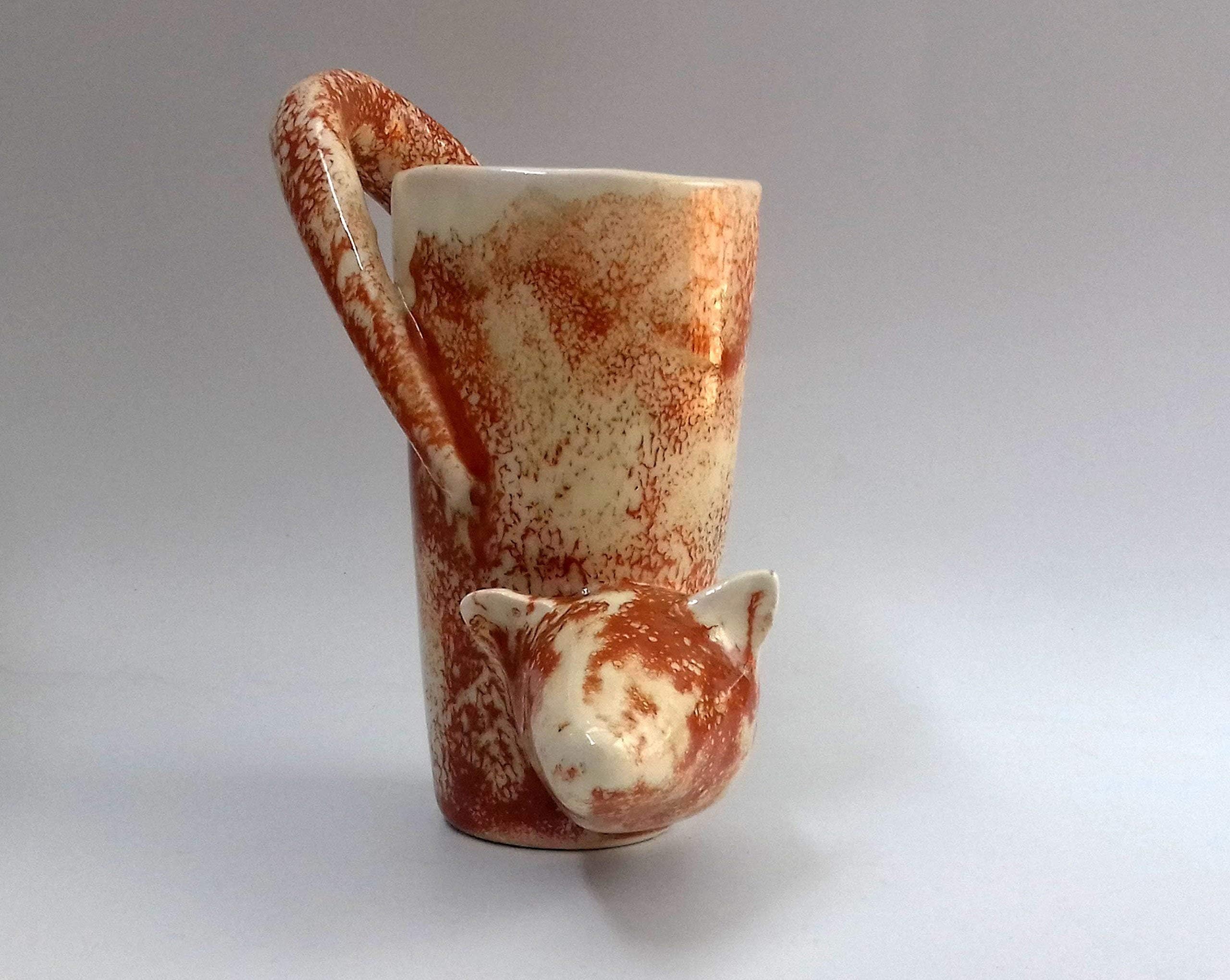 Handmade arts and abstract designed ceramics tea and coffee vole mug