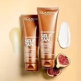 CLARINS Self Tanning Milky Lotion Face Body Natural Glow Hydrating Buildable Tan view 8