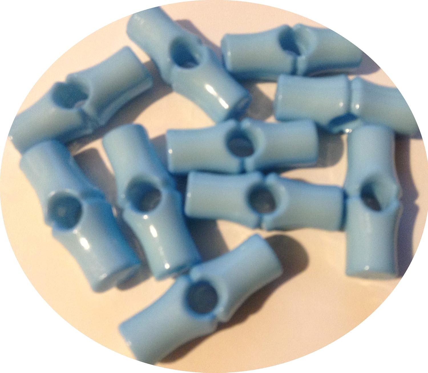 10 x 25mm Baby Blue Plastic Toggle Buttons. These Buttons are Plastic