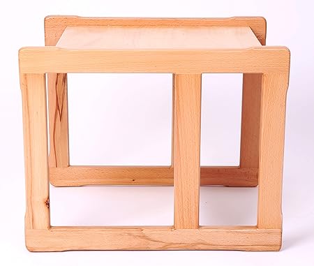 juguete de madera con punta de metal