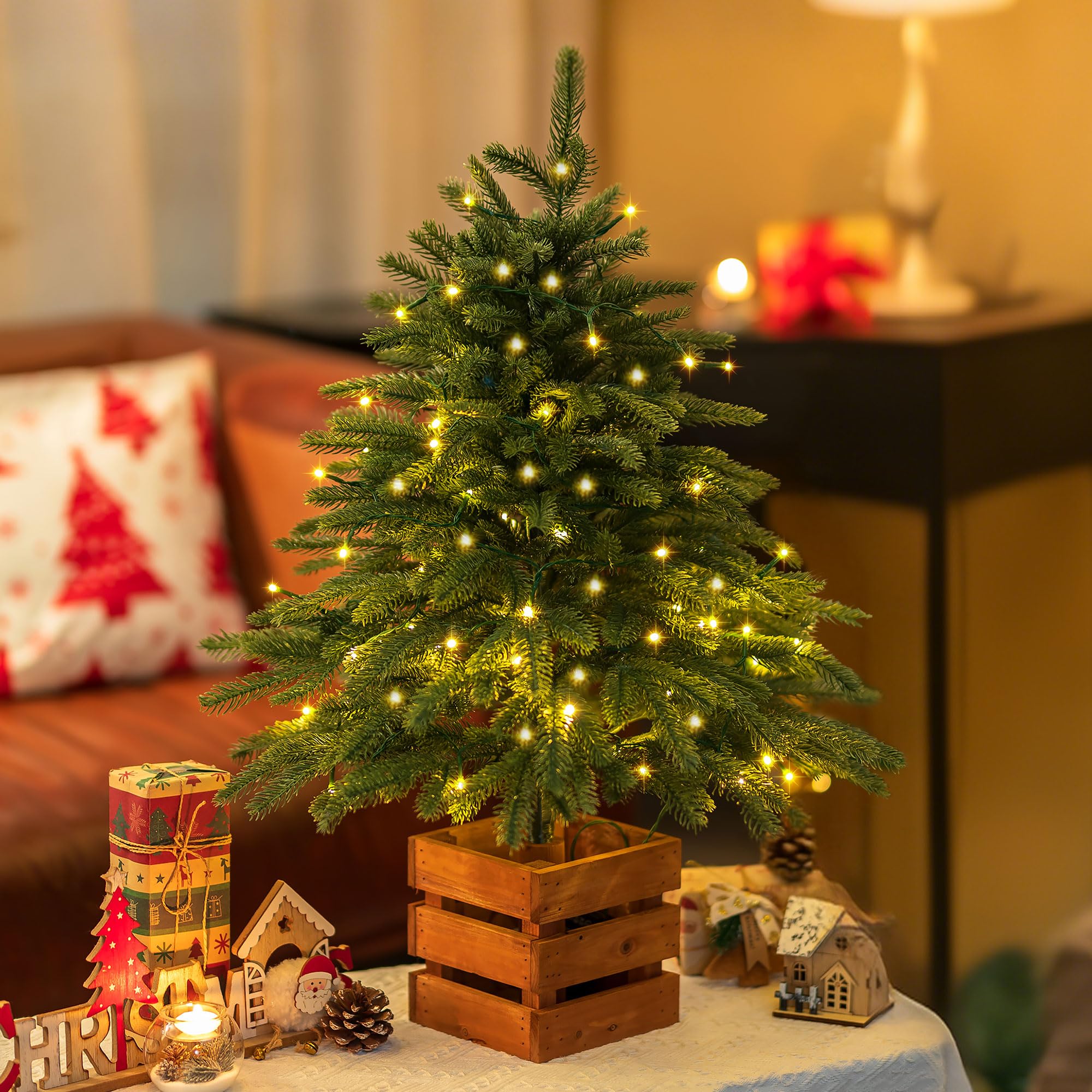 Photo 1 of BLOSMON Christmas Norfolk Pine Tree: 2.6ft Small Table Top Christmas Tree with Lights - Remote Control 70 LEDs Timer 8 Lighting Modes Wooden Pot - Mini Artificial Xmas Trees Desk Home Decor