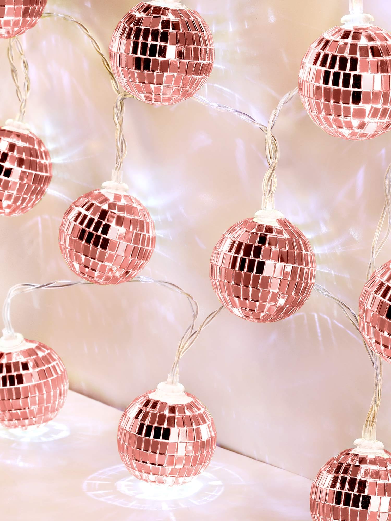 Photo 1 of BBTO LED Disco Ball String Light Battery Powered Mirror Balls Ornaments for Outside Backyard Porch 70s 80s Disco Party Supplies(1.57 Inch,Rose Gold)