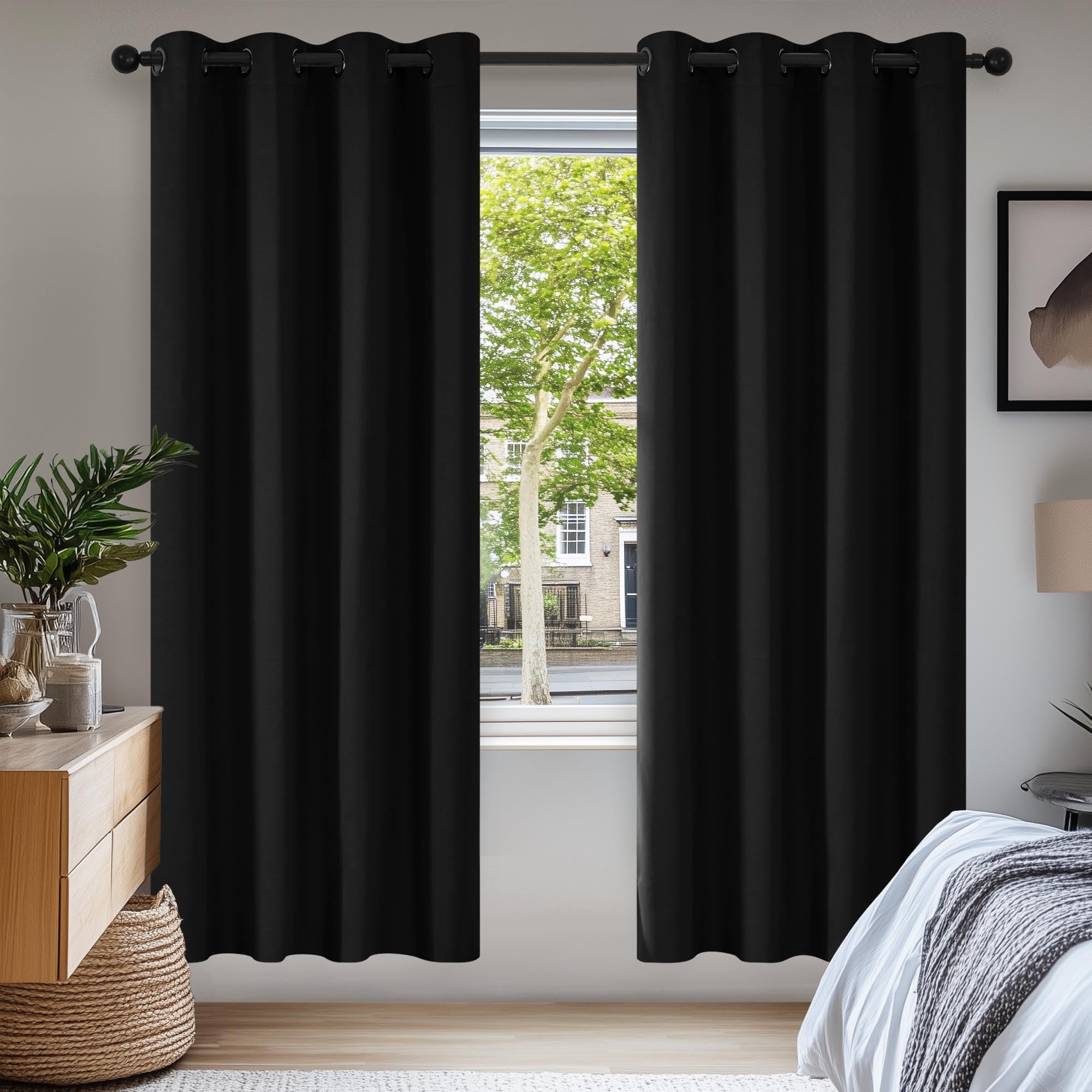 Deconovo Solid Thermal Insulated Energy Saving Eyelet Blackout Curtains for Bedroom Including 55x69 Inch Two Panels Black