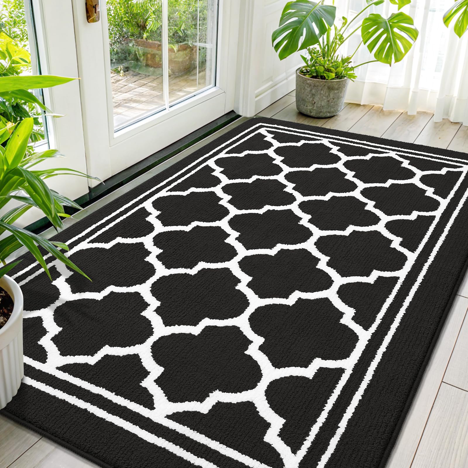 Photo 1 of Buganda Large Indoor Door Mat, Dirt-Resistant and Absorbent Doormat, Anti-Slip, Low Profile Floor Mats for Inside Entryway, Front, and Back Door Entrance (59x35 Inches, Black)