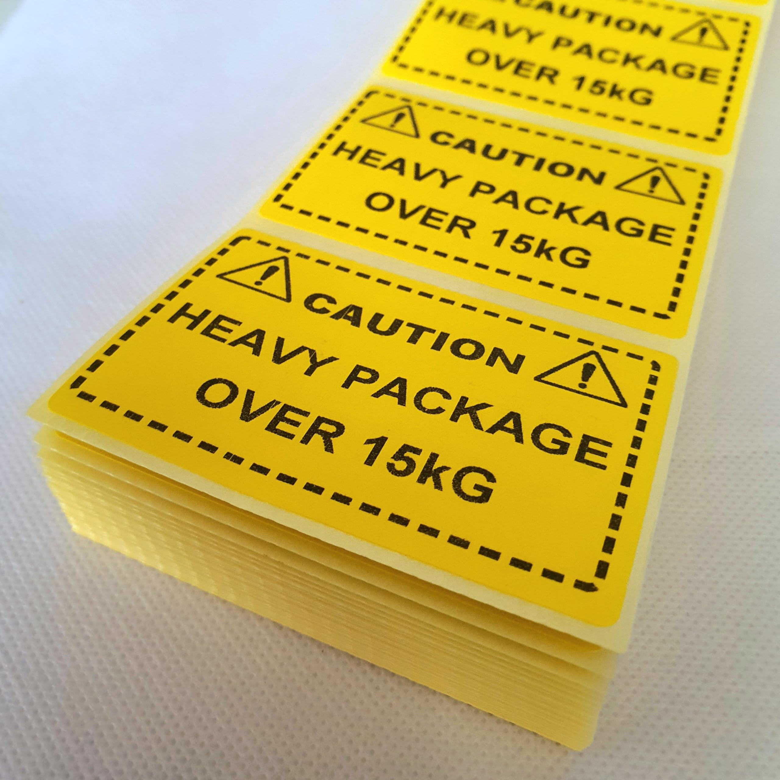 500 X Caution Heavy Package Over 15Kg Labels Yellow Stickers. 3 x 2" "Caution Heavy Package Over 15kg" Labels. FBA Compatible Labels. EJI Labels