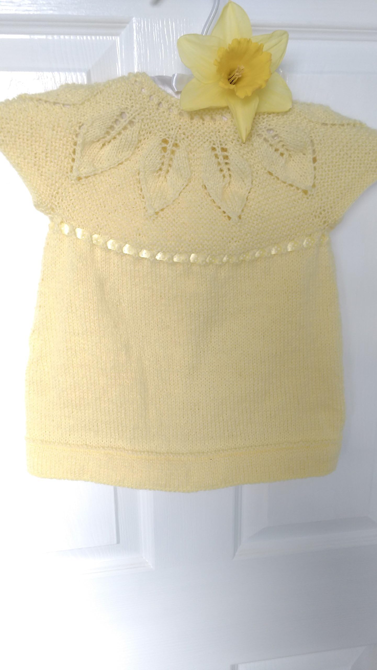 Abey - sunshine yellow, hand knitted, short sleeved, little girls tunic/cardigan/dress. Leaves design. Aged 2 - 3 years.