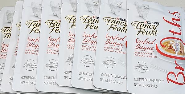 FANCY FEAST CAT FOOD COMPLEMENTS FANCY FEAST® BROTHS® WET CAT FOOD COMPLEMENT WITH SEAFOOD BISQUE AND ACCENTS OF REAL LOBSTER