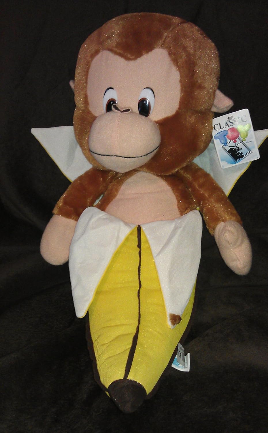stuffed monkey with banana
