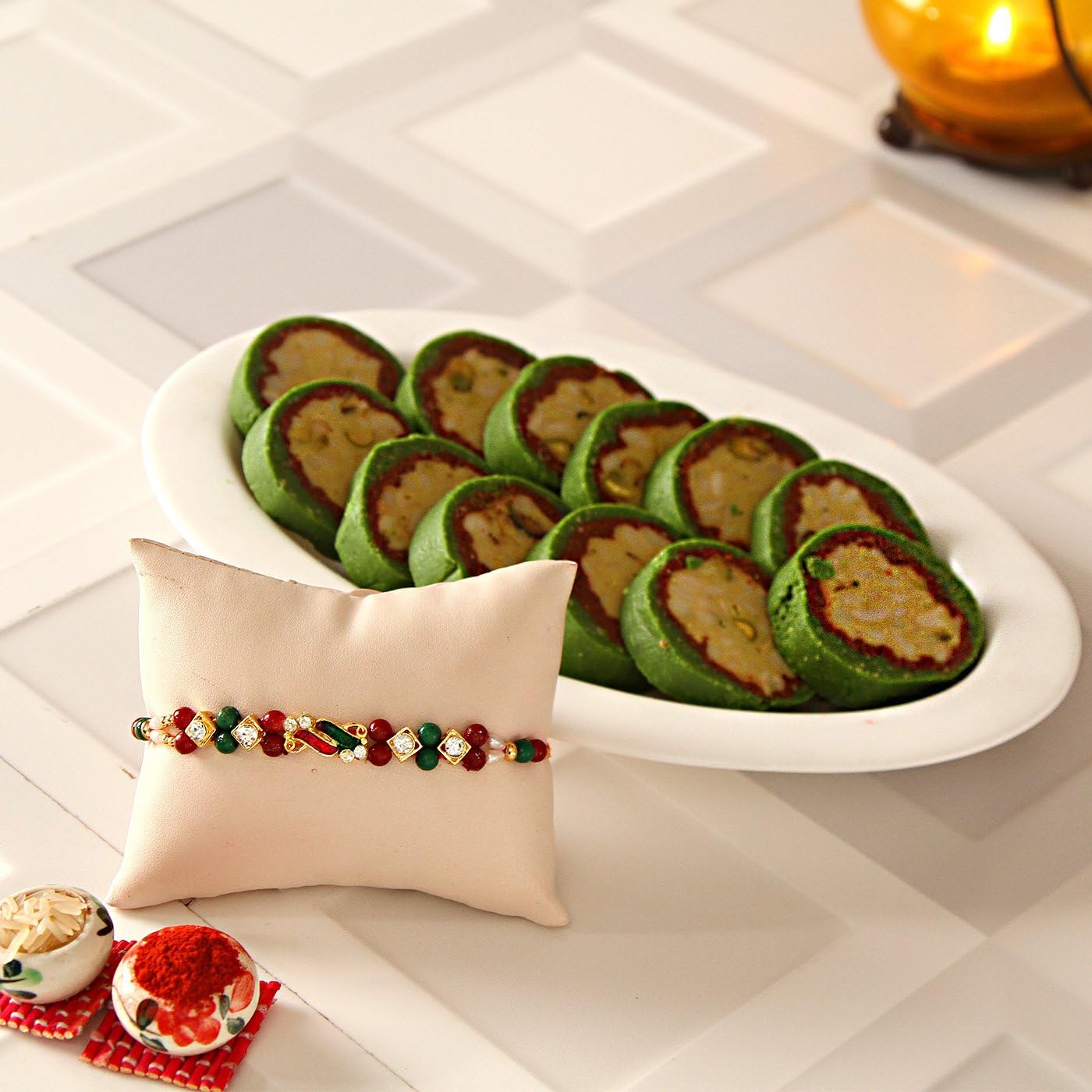 Charming Red & Green Rakhi with kaju Pista Cassata